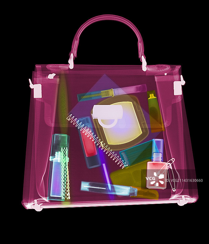 彩色X光下的女士手提包及其物品图片素材