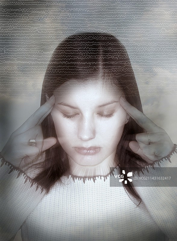 手扶太阳穴的女人图片素材