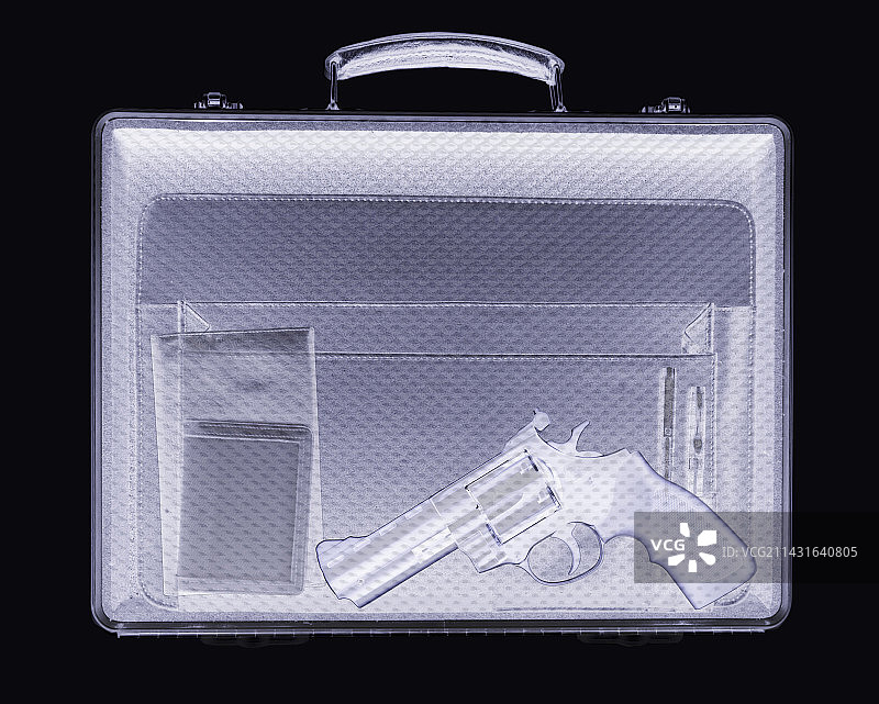 公文包里的手枪X光模拟图图片素材