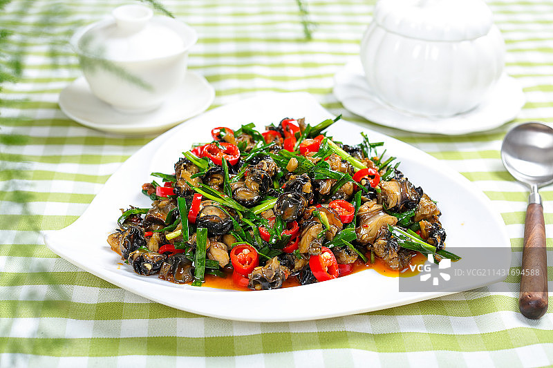 美味下酒菜辣炒田螺肉图片素材