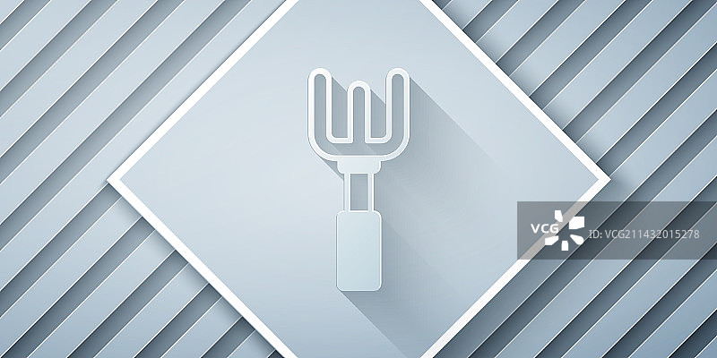 剪纸风格：灰色背景上的花园耙子图标图片素材