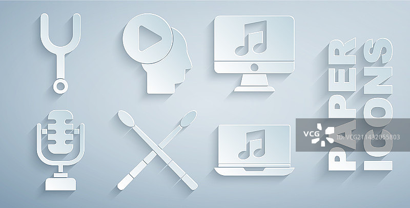架子鼓、鼓槌和带有音符的电脑组合图片素材