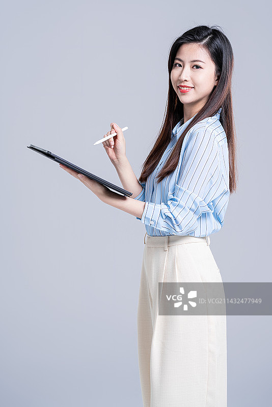 年轻漂亮的商务女白领图片素材