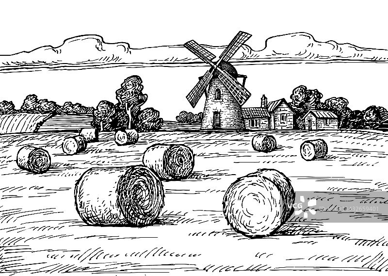 干草堆、田野和磨坊图片素材