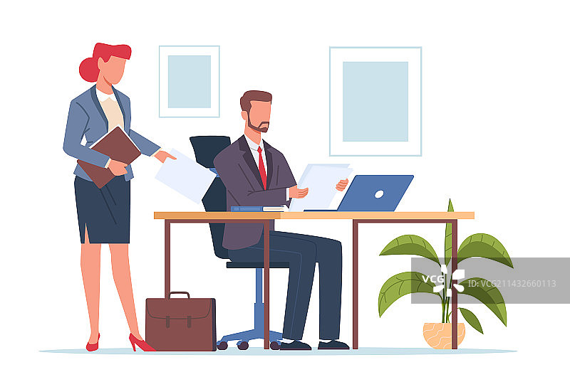 老板和秘书在办公桌前图片素材