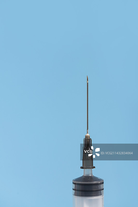 注射器特写禁毒防护艾滋病蓝色背景图片素材