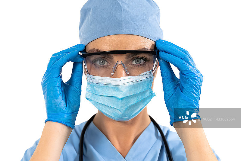 戴防护眼镜的女外科医生图片素材