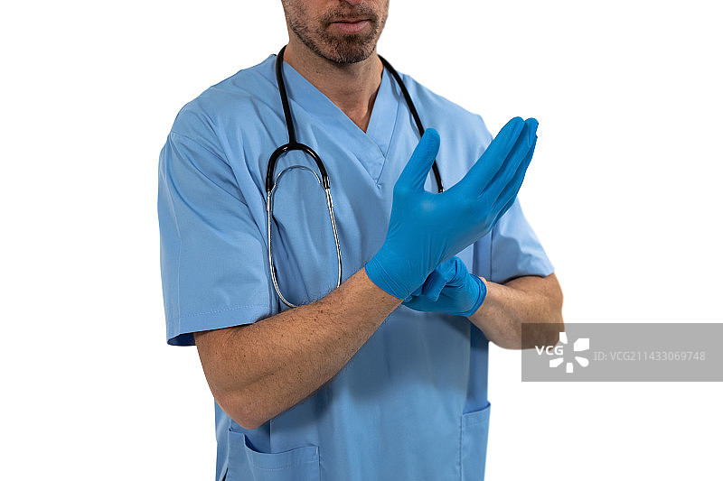 戴着防护手套的男外科医生图片素材