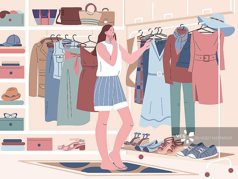 衣柜间：有衣服在架子上的女人图片素材