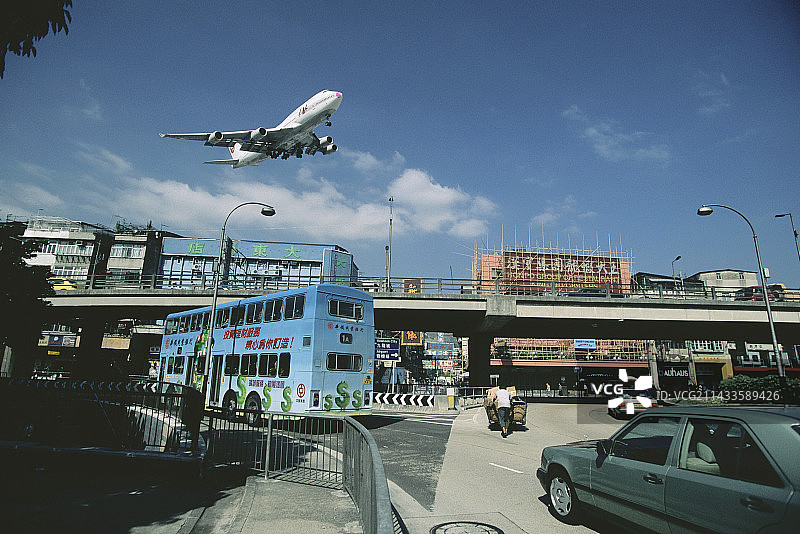 飞机降落启德机场图片素材