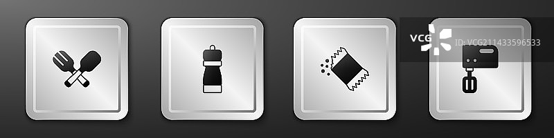 交叉摆放的叉子、勺子和胡椒粉包图片素材