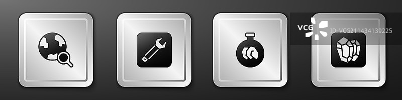 地球仪扳手放大镜组合图片素材