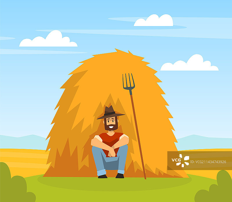 戴帽子的农民倚靠在干草堆上图片素材