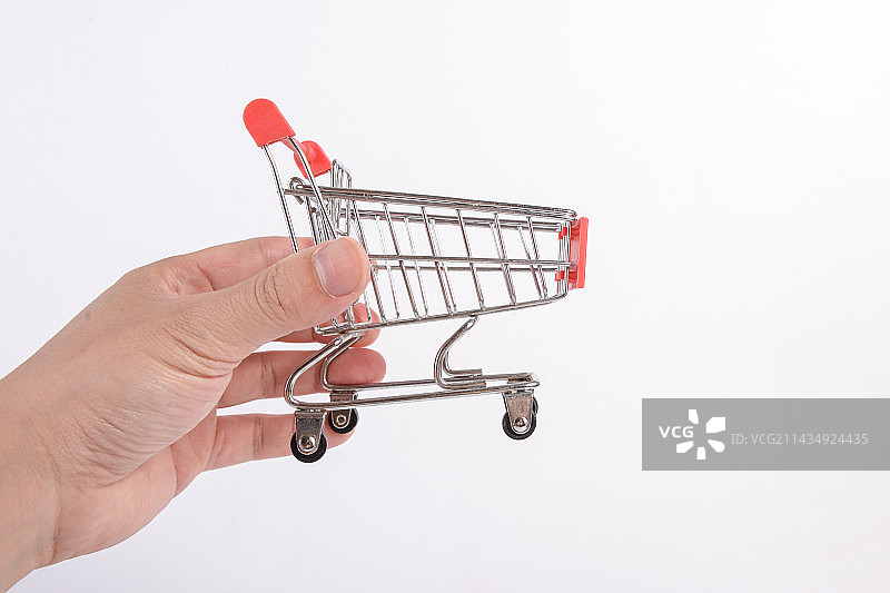 手拿微型手推车图片素材