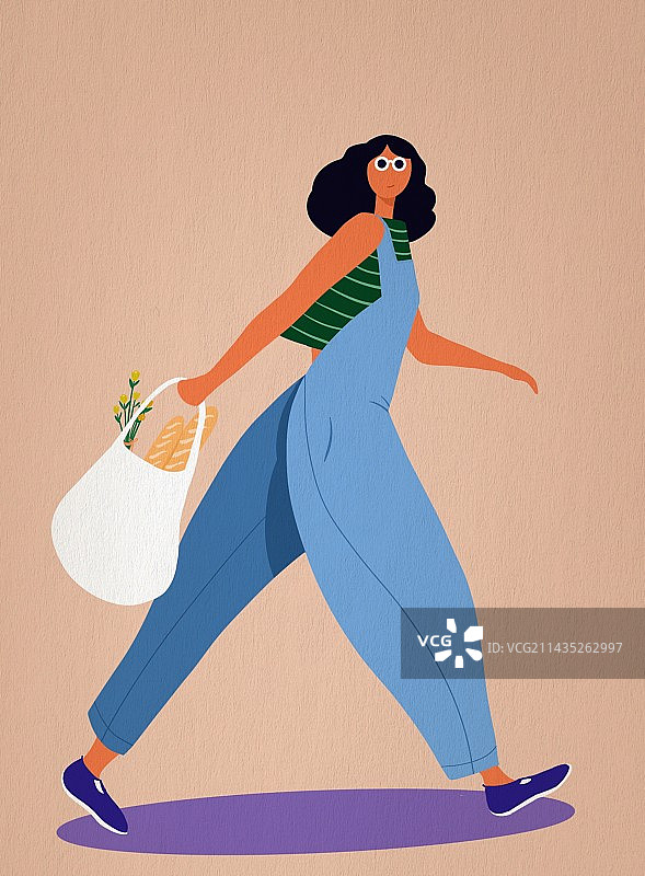 大步行走的时尚女孩图片素材