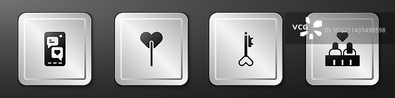 带有心形棒棒糖钥匙的移动设备图片素材