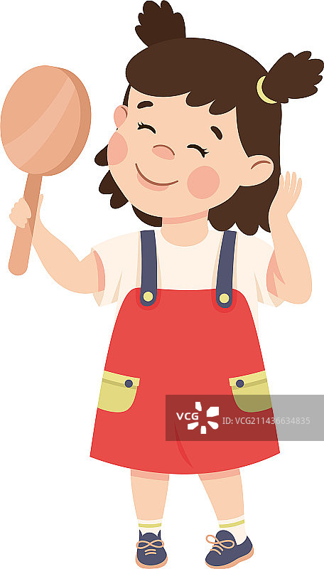 照镜子的微笑小女孩图片素材