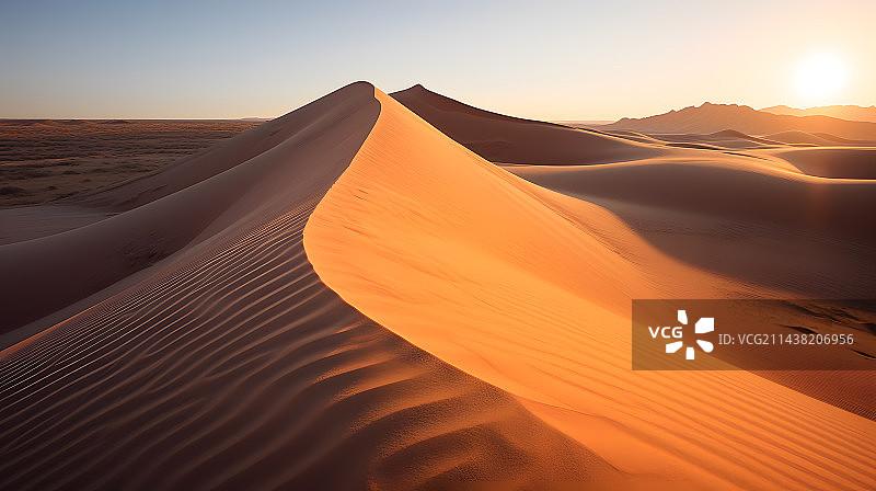 落日照在沙脊上图片素材