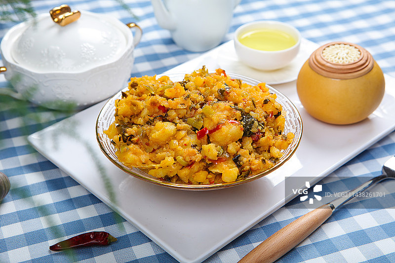 云南特色菜老奶洋芋酸菜炒土豆泥图片素材