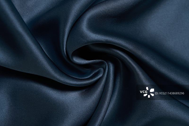 蓝色的丝绸扭曲形状图片素材