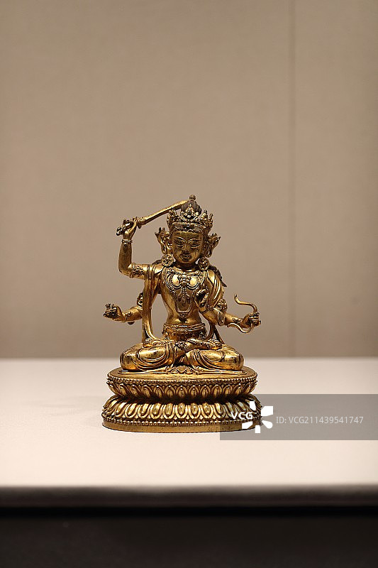 明 永乐款銅鎏金四臂文殊菩萨像图片素材