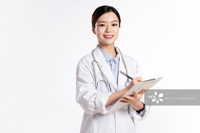 写病历的年轻女医生图片素材