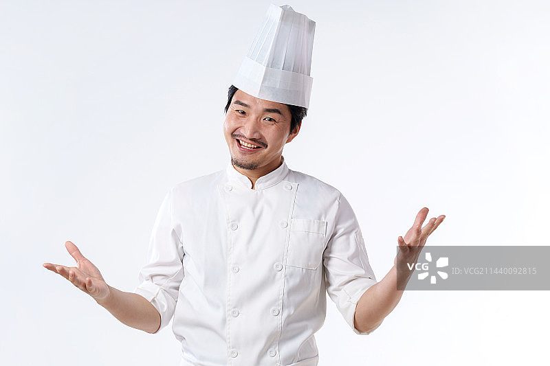 穿着厨师服自信的中年男人图片素材