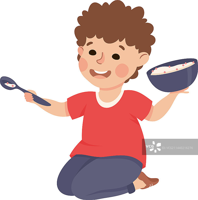 可爱的小男孩坐在地上抱着东西图片素材