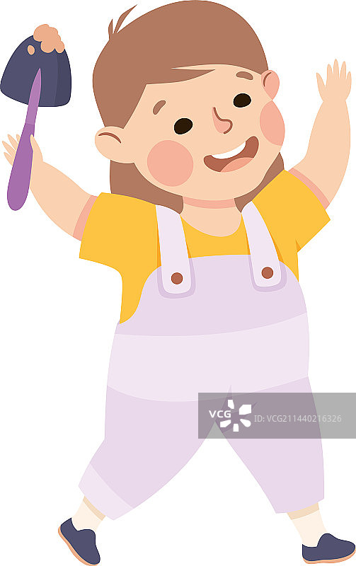 快乐的小女孩拿着勺子图片素材