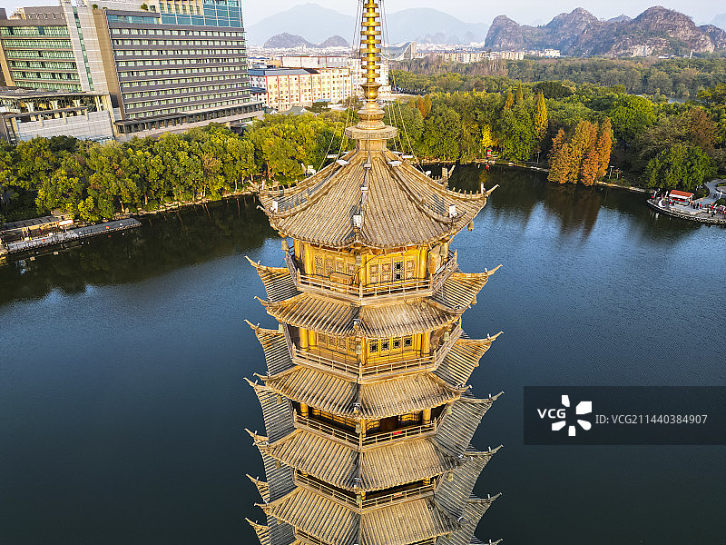 广西壮族自治区桂林市日月双塔文化公园航拍视角夕阳绚丽风景图片素材