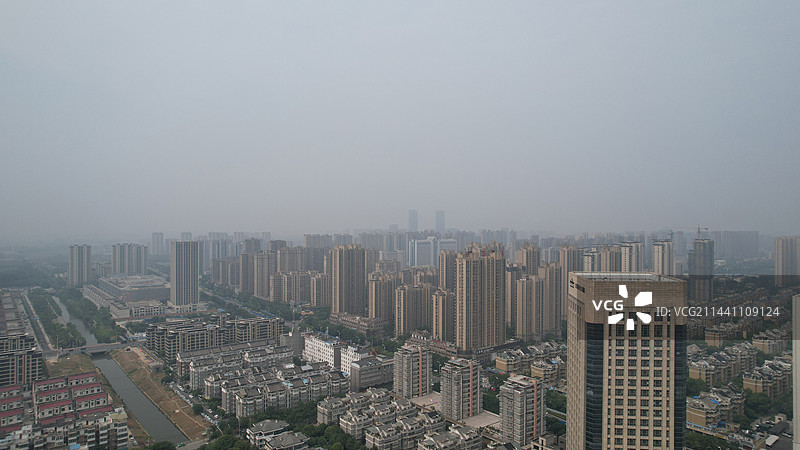 晨雾中安徽阜阳颍州万达商圈航拍，Fuyang, Anhui Province, China图片素材