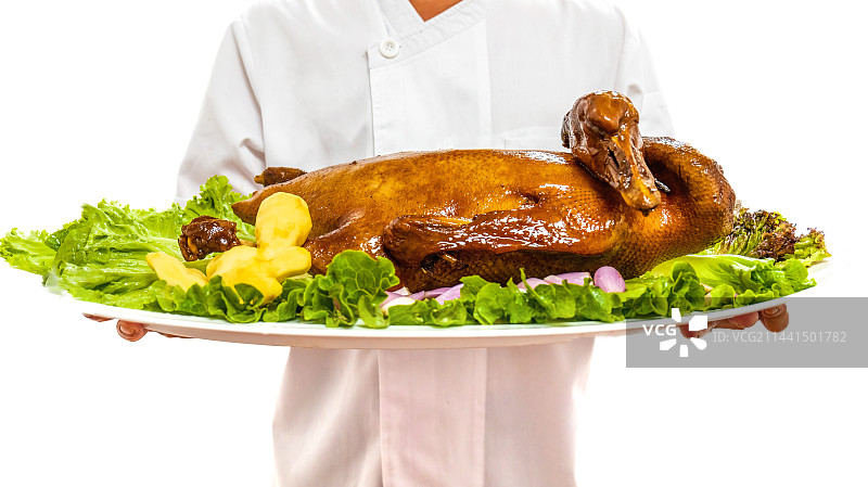 端起一整只烧鹅图片素材