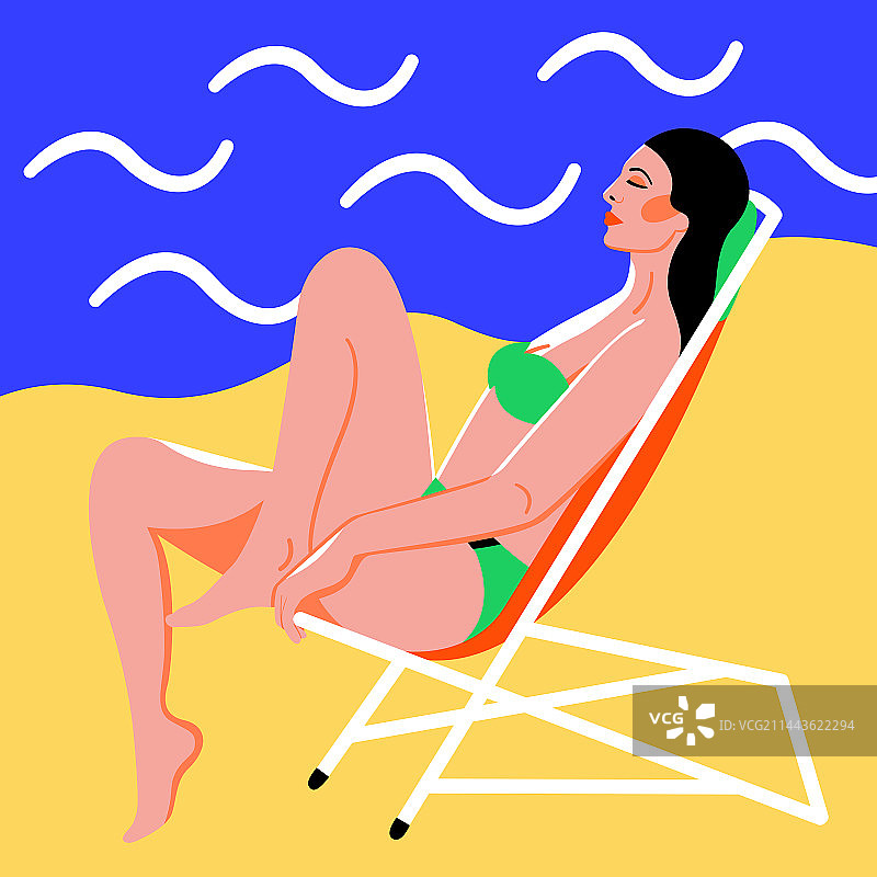 沙滩上日光浴的女性图片素材