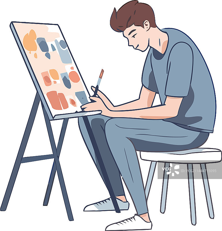 一人在桌旁绘画图片素材