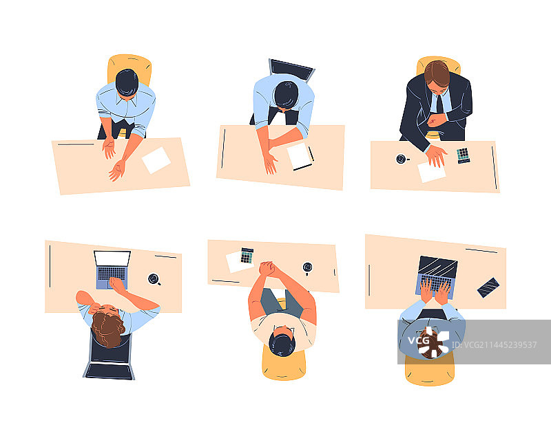 男女办公室职员坐在桌旁图片素材