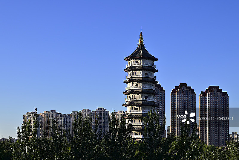 天津宁园致远塔与现代高层建筑图片素材