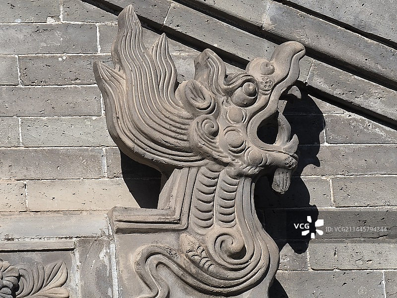 山西民居传统龙头砖雕建筑结构特写图片素材