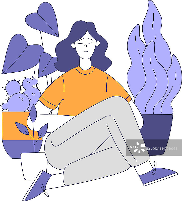 快乐的女人抱着生长的植物图片素材