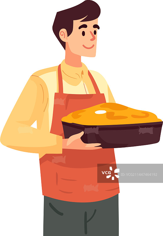 厨师在厨房里端着蛋糕微笑图片素材