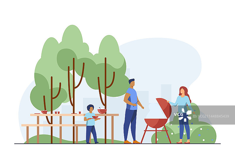 父亲在野餐时烤肉图片素材