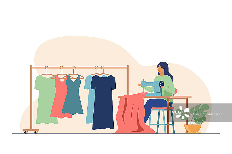 女人在缝纫机上缝制新连衣裙图片素材