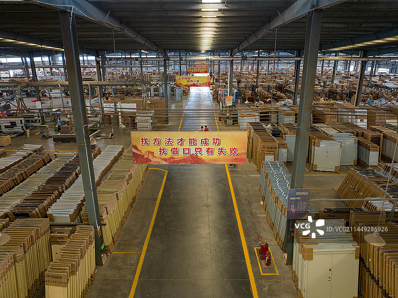 河南周口长城门业安利来门工厂生产线木门铁门防火门图片素材