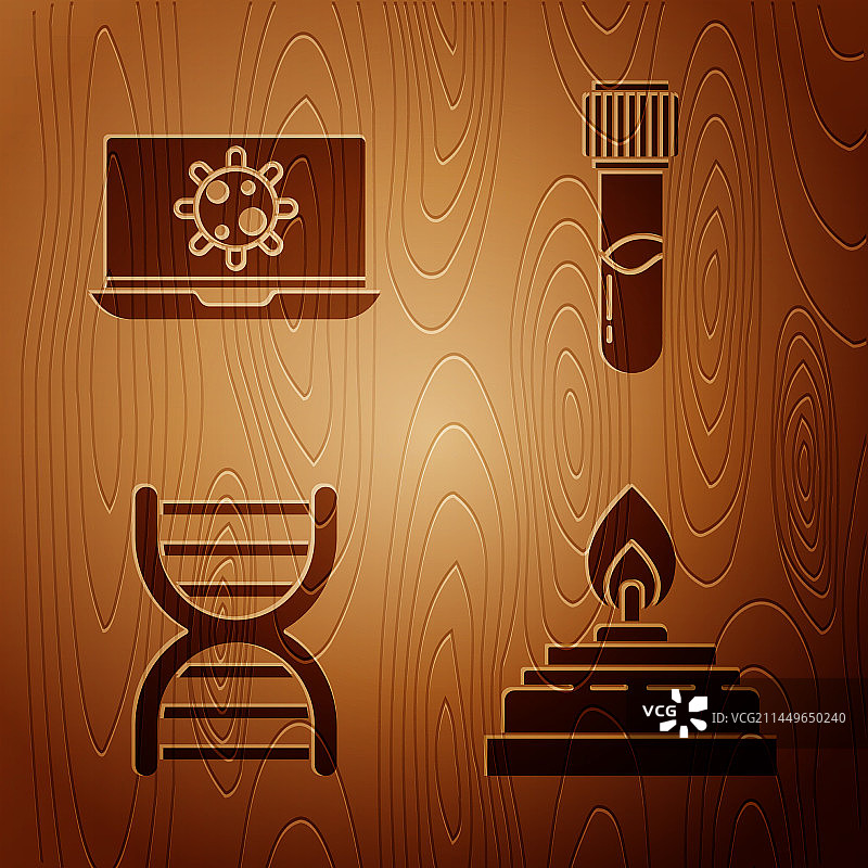 笔记本电脑上的酒精喷灯和细菌图片素材