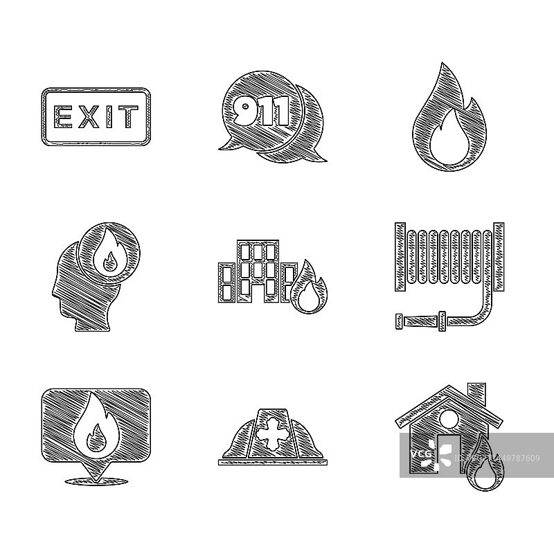 燃烧建筑中消防员头盔与火灾图片素材