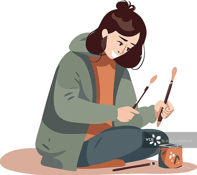 用画笔绘画的年轻人图片素材