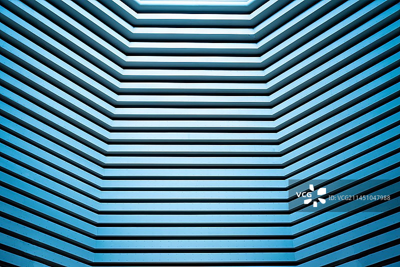 无锡灵山梵宫建筑内部大厅屋顶层层递进的规则的几何结构图片素材