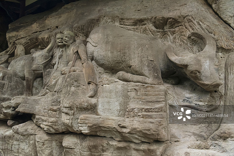 四川重庆大足石刻之宝顶山石刻：牧牛图图片素材