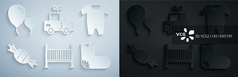 婴儿床、摇篮、床、服装、糖果和袜子套装图片素材