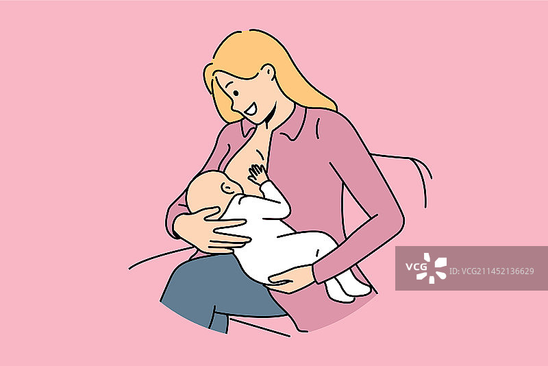 女人给婴儿喂奶并微笑图片素材