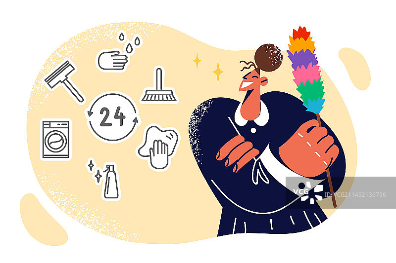 女佣拿着掸子笑着图片素材